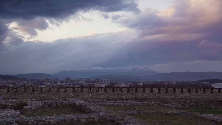 Fortress in Skopje, North Macedonia with snowcap mountains in the background during late sunset