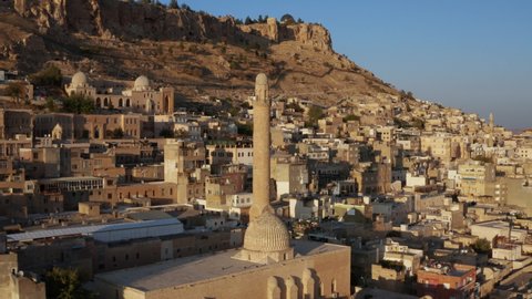 Artuqid Architectural Landscape Of Mardin Old Town On Sunset In Southeastern Turkey. Aerial