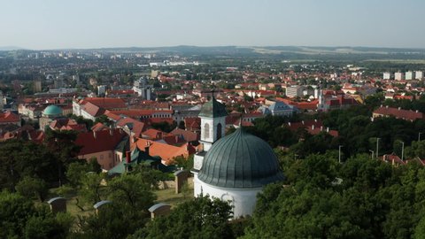 Cityscape And Small Chapel In Pecs, Hungary - aerial drone shot