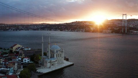 Ortakoy Mosque and Istanbul Bosphorus Bridge Landscape At Sunrise - aerial drone shot