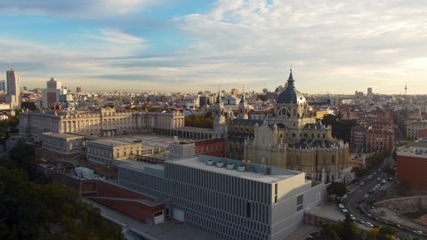 Top view of Royal Palace of Madrid and Almudena cathedral at the sunrise, Spain.