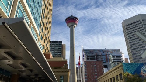 Calgary, Albert, Canada - September 28 2021: Walking towards Calgary tower in city center. Sunny day view on the Calgary downtown.