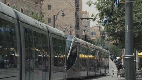 A modern tram on Jerusalem Street, Jerusalem, Israel - 5 may 2021