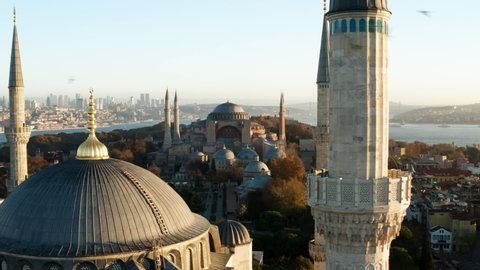 Minarets Of Blue Mosque With Hagia Sophia Mosque In The Background At Sunrise In Fatih, Istanbul, Turkey. - aerial