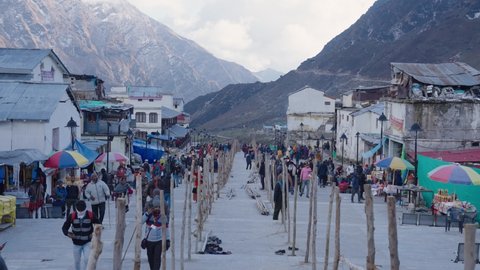 Kedarnath , India - 10 29 2021: Locals And Tourists Walking Towards The Kedarnath Temple To Pray In Kedarnath