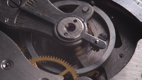 Clockwork detail with gear. Old clock mechanism works. Successful business or teamwork concept. Machinery abstract, inside of mechanic watch