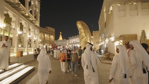 Doha - Qatar - november 2021 - Qatari man walking at street market at Souq Waqif in Doha Qatar

