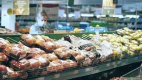 Women in face masks are shopping in the fruit section - Powered by Shutterstock - Get 15% off with code: PIKWIZARD15