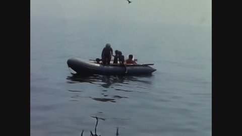 SANREMO, ITALY JULY 1967: Family vacation on the sea dinghy in 60's