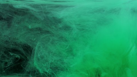 Green ink acrylic paint mixing in water, swirling softly underwater. Colored acrylic cloud of paint in aquarium. Slow motion abstract smoke explosion animation. Beautiful art background