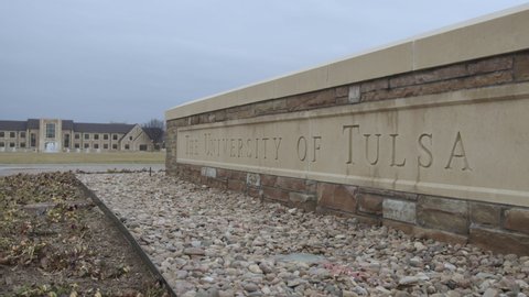 Tulsa, Oklahoma - January 19, 2022: The University of Tulsa college campus sign and buildings