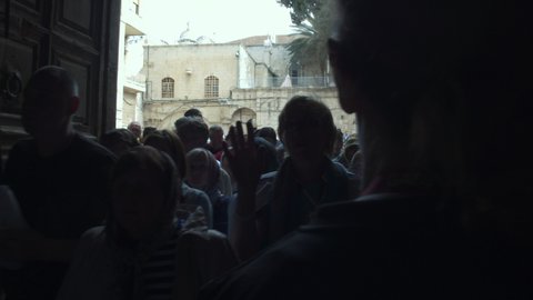 Many pilgrims entering the Church of the Holy Sepulchre, Jerusalem, Israel - 6 may 2021