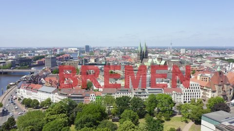 Inscription on video. Bremen, Germany. The historic part of Bremen, the old town. Bremen Cathedral ( St. Petri Dom Bremen ). View in flight. On the mechanical display, Aerial View