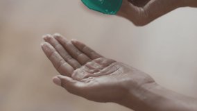 Best hair care cosmetics. Close up shot of unrecognizable woman pouring shampoo on hand and washing her hair, slow motion, empty space - Powered by Shutterstock - Get 15% off with code: PIKWIZARD15