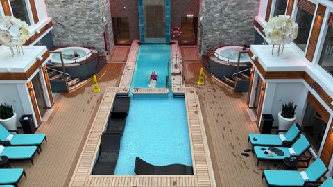 Orlando, FL USA - January 8, 2022:  The Haven Pool on the Norwegian Cruise Lines Haven cruise ship Escape in Port Canaveral, Florida.