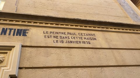 Aix-en-Provence, France - August 2021 : "the painter paul cézanne was born in this house" engraved on the birthplace of famous painter Cezanne in the Rue de l'Opera street in Aix en Provence, France