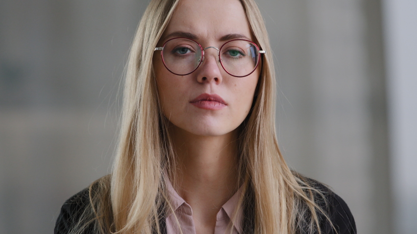 Caucasian business woman girl in glasses worker manager holding throat indoors feels discomfort sore throat respiratory disease covid symptom panic attack suffocation lack of air suffering from asthma | Shutterstock HD Video #1085885906