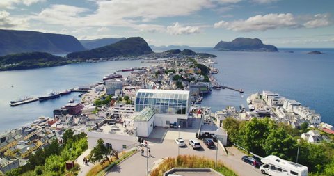 Bird's eye view of Alesund port town on the west coast of Norway, at the entrance to the Geirangerfjord. Colorful daytime scene of the Nord. Traveling concept background.