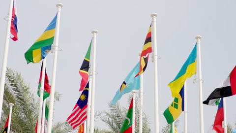 Dubai, United Arab Emirates - January 2022: Expo 2020, Flags of world different international countries blowing at entrance exhibition. development, mobility, opportunities future technology business