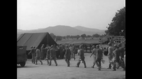 CIRCA 1944 - American soldiers go through a chow line at the Ramgarh Training Center in India.
