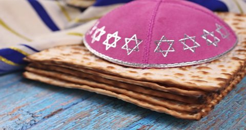 Orthodox Jewish prepared with Torah Scrolls kosher matzah on traditional jewish passover holiday