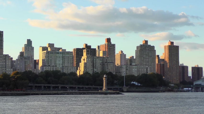 The Upper East Side in Manhattan, as seen from the Socrates Sculpture Park located in the neighbourhood of Astoria, Queens, in New York City, 2018
 Royalty-Free Stock Footage #1085907410