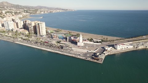 Aerial view of La Farola Malaga Lighthouse at harbour, Costa del Sol, Spain