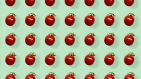 Colorful pattern of fresh red tomatoes. Seamless pattern with cherry tomato. Pop art design. Realistic animation. 4K video motion
