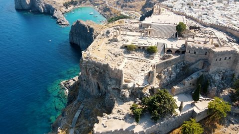 Lindos small whitewashed village and the Acropolis, scenery of Rhodos Island at Aegean Sea