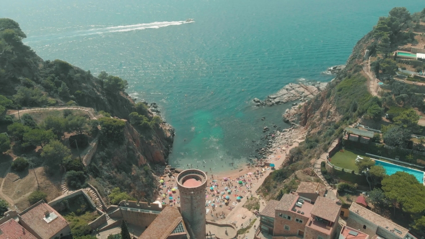 Aerial view of incredible cliff and Mediterranean Sea in Tossa de Mar, Costa Brava In Spain, Catalonia Royalty-Free Stock Footage #1085925317