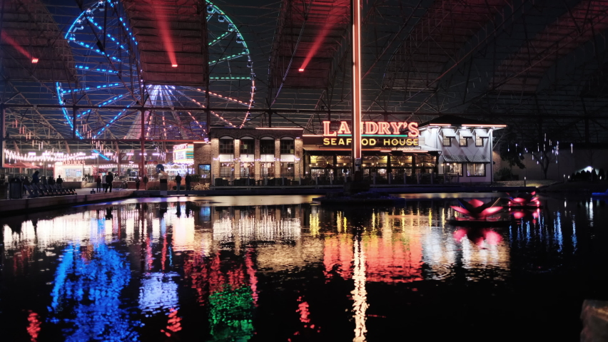 St. Louis , Missouri , United States - 01 14 2022: Colorful light show illuminates Union Station in St. Louis at night.