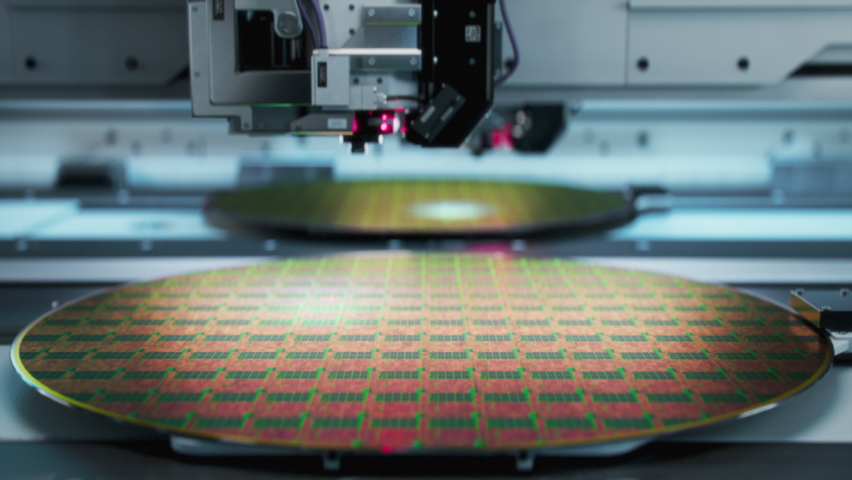 Shot of Silicon Wafer being processed at Advanced Semiconductor Foundry, that produces Computer Chips. | Shutterstock HD Video #1085930489