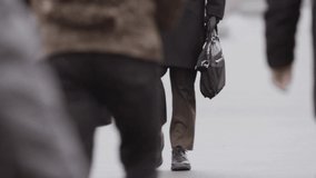 Unknown Office Manager or Business man Commute to Work in the Morning or from Office on Foot. Pedestrian are Dressed Smartly. Successful People Walking in Downtown slow motion shot stock video footage