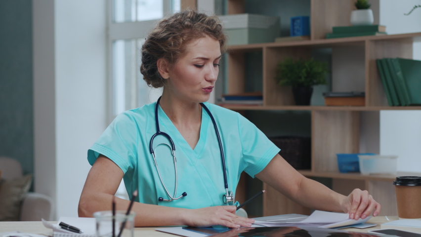 Professional Doctor Talking Looking at Camera in Conference Call Video. Physician Female Speaking Online Remote Web Cam Chatting with Patient. Concept e-health Medical Assistance Virtual Consultation Royalty-Free Stock Footage #1085934089