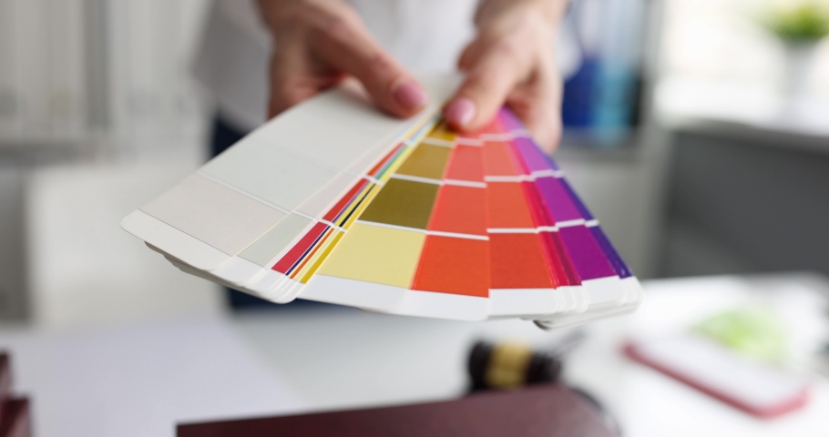 Designer shows color palette of samples closeup Royalty-Free Stock Footage #1085940779