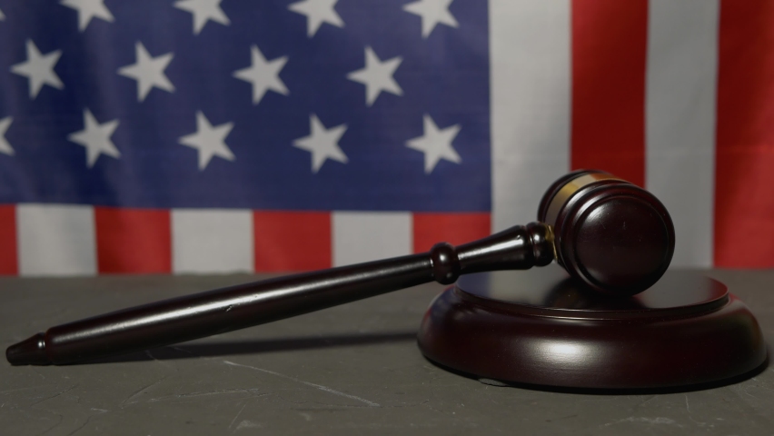 Judge's gavel on the background of the american flag 