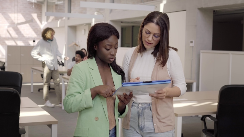 Female executive telling idea diverse project team at office meeting. Only Women Team working in a proyect. | Shutterstock HD Video #1085969372
