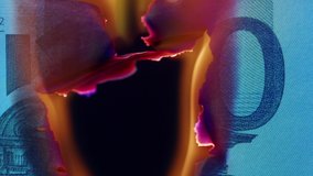 Burning of 100 euro banknote on black bacground close-up. Flame of fire from cash. Financial crisis and depressed economy. Paper money loss concept. - Powered by Shutterstock - Get 15% off with code: PIKWIZARD15
