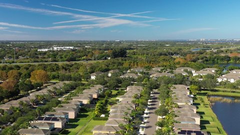 Sarasota, Florida. Peaceful suburbs estate next to lakes, near highway. Aerial view