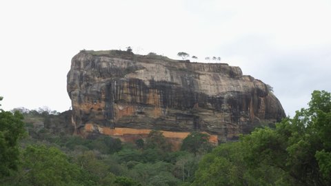 Wide view of beautiful Sigiriya aka Lion Rock the ancient rock fortress near Dambulla in the Central Province of Sri Lanka.