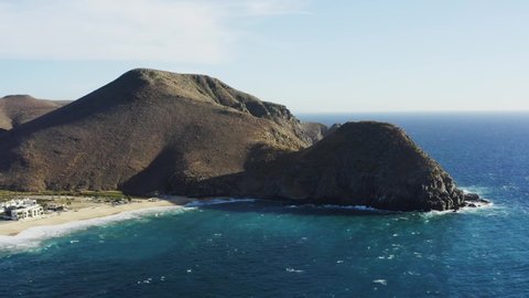 Drone rises over the hill in Punta Lobos Baja California Sur