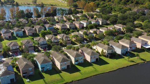 Sarasota, Florida. Peaceful suburbs neighborhood with lakes nearby, next to highway. Aerial view