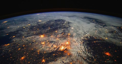 Time-lapse of planet Earth with city lights on. Elements of this image furnished by NASA