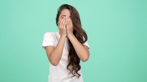 teen girl long curly hair sneezing with smiling face, sneeze