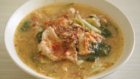 Sukiyaki Soup with Pork in Thai Style or boiled vermicelli with pork and vegetables in sukiyaki soup - Asian food style
