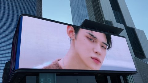 Seoul, South Korea - September 12 2021: K-pop star Tomorrow by Together's new album ad on the digital billboard.
