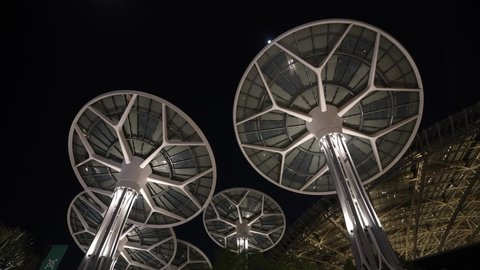 The solar panels at giant trees on the Terra Sustainability Pavilion Expo 2020 at night. Dubai UAE 2022.01.14