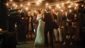 Beautiful Happy Lesbian Couple Celebrate Wedding at an Evening Reception Party with Diverse Multiethnic Friends. Queer Newlyweds Dancing at a Restaurant Venue. LGBTQ Relationship and Family Goals. - Powered by Shutterstock - Get 15% off with code: PIKWIZARD15