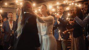 Beautiful Happy Lesbian Couple Celebrate Wedding at an Evening Reception Party with Diverse Multiethnic Friends. Queer Newlyweds Dancing and Kissing at a Restaurant Venue. LGBTQ Relationship Goals. - Powered by Shutterstock - Get 15% off with code: PIKWIZARD15