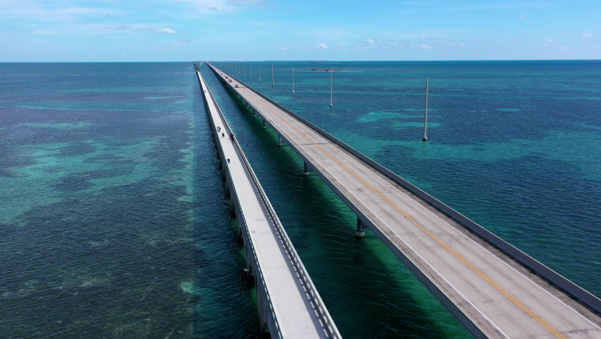 Aerial shot of the Seven Mile Bridge in Florida which connects several of the Florida Keys on the way to Key West Royalty-Free Stock Footage #1086002489